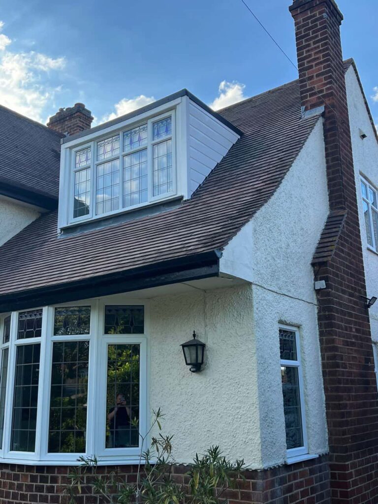 This is a photo of a dormer window which has just had some repairs carried out where the roof and the dormer meet. Works carried out by LS Roofing Feltham